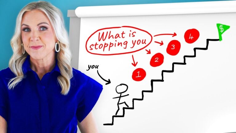 Stacy Tuschl stands beside a flipchart showing a stick figure climbing stairs labeled 1 to 4. Red text at the top reads What is stopping you, with arrows pointing to the steps and a green flag with a dollar sign at the top.